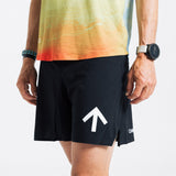 Close-up of the AROW Marathon Short v.2 in Black and White, showing the white arrow and Chance logo on the leg